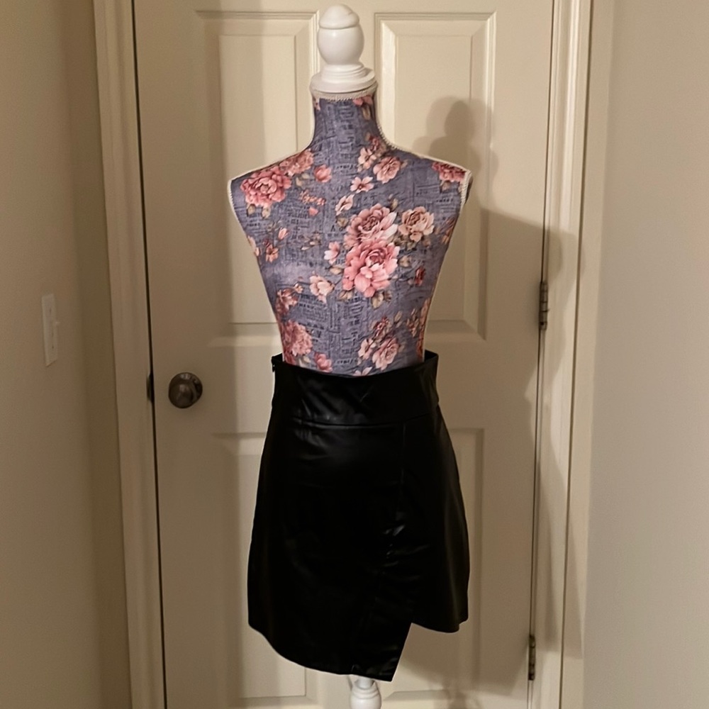 Black, faux leather, size small skirt.